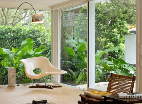 minimalistic-interior-overlooking-lucious-garden